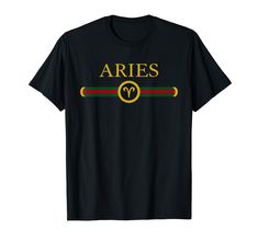 an aries t - shirt with the word aries in gold and green on it