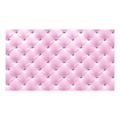 a pink wallpaper with diamonds on it