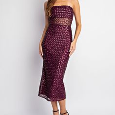 Get Ready To Set The Party Ablaze With The Stunning Patterned Sequin Midi Dress! Made From A Mix Of Polyester And Spandex With A Soft Polyester Lining, It's The Perfect Combo Of Comfort And Quality. The Dress's Deep Wine Shade Is Sure To Turn Heads, And You Won't Have To Worry About Any Complicated Care Instructions. Let's Paint The Town Red! Fitted Midi Length Strapless Dress For Party, Bodycon Strapless Midi Dress For Party, Purple Strapless Evening Bodycon Dress, Evening Purple Strapless Bodycon Dress, Evening Strapless Purple Bodycon Dress, Strapless Purple Bodycon Evening Dress, Glamorous Sleeveless Purple Midi Dress, Purple Strapless Midi Dress For Night Out, Strapless Midi Dress For Date Night Party Season