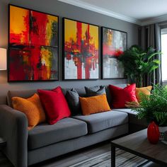 a living room filled with furniture and paintings on the wall above it's coffee table