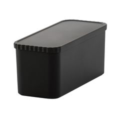 a black plastic container on a white background