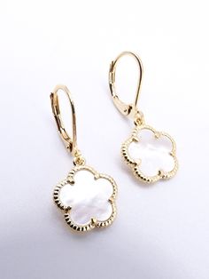 Artistically crafted with intricate exquisite style! These gorgeous ultra lightweight dainty leverback hook earrings feature a 18kt gold plated 5 petal mother of pearl shell clover flower. Lightweight, ornate and delicately crafted, these luxurious ultra lightweight clover earrings are truly one-of-a-kind and look great worn for any occasion. Available in 18kt Gold Plated and 18kt White Gold Plated with matching bracelets and necklaces also available.  ☆ Specifications: * Approximate size  1 1/8 Elegant Hypoallergenic Flower-shaped Earrings, Elegant Hypoallergenic Flower Shaped Earrings, Elegant Floral Earrings With French Hook, Elegant Flower Shaped Earrings With French Hook, Elegant Flower Earrings With French Hook, Elegant Dangle Flower Earrings With French Hook, Elegant Flower-shaped Earrings With French Hook, Flower-shaped Lever Back Earrings, Elegant Flower Drop Earrings With Lever Back