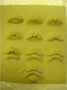 there are many fake eyes on this cake molding sheet that is ready to be made in the oven