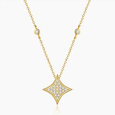 Stella Pendant Necklace | Necklaces by DORADO Celestial Pendant Necklace With Diamond Accents, Celestial Gold Diamond Pendant Necklace, Gold Star-shaped 14k Diamond Necklace, Luxury Star-shaped Necklace With Diamond Accents, Yellow Gold Star-shaped Cubic Zirconia Necklace, Platinum Pendant, Silver Coat, Star Design, Luxury Gift Box