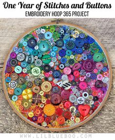 a cross stitch pattern with buttons on it and the words one year of stitches and buttons embroidery hoop project