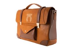 a brown and tan leather bag with the letter o on it's front pocket