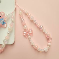 Pink Bow Tie Phone Charm Strap Phone Lanyard Phone - Etsy Singapore Diy Beaded Necklaces Ideas, Phone Lanyard Ideas, Pink Diy Jewelry, Phone Lanyard Aesthetic, Phone Charm Tutorial, Lanyard Beads, Cute Phone Strap, Pink Phone Charms Clay Beads, Phone Charm Aesthetic