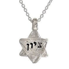 Description and Details ציון TZION Zion Zion is often used as a synonym for Jerusalem. Sterling silver charm imprinted with texture from the stones of the Western Wall in Jerusalem. Inscribed in Hebrew Pendant size is 5/8″ (20mm) Chain length 16″ (42cm) 63 x .63 in HWN2B Symbolic Charms Necklaces For Commemoration, Symbolic Charms Necklace For Commemoration, Silver Star Of David Charm Jewelry, Spiritual Silver Jewelry With Star Charm, Silver Star Of David Jewelry With Charms, Silver Heart Necklace With Star Charm, Spiritual Star Charm Pendant Jewelry, Spiritual Star Charm Pendant Necklace, Sterling Silver Star Of David Necklace For Anniversary