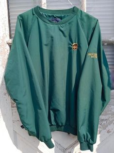 "Lightly used unique green pullover UPS windbreaker jacket Mens XL Providence, RI. V-neck lined windbreaker with rib knit on cuffs and bottom hem of jacket. Outer is polyester, inside is lined with nylon. UPS logo on chest, \"Providence, RI\" in lettering on left sleeve. Manufactured by Charles River Apparel. NOT handmade." College Winter Crew Neck Windbreaker, College Winter Windbreaker With Crew Neck, Green Crew Neck Outerwear For Outdoor, Ups Logo, Windbreaker Jacket Mens, Green Pullover, Charles River, Providence Ri, Windbreaker Jacket