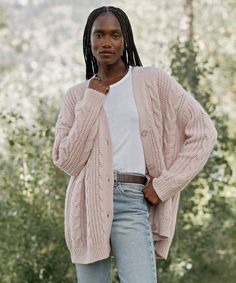 Cable Cocoon Cardigan Blush Using our best-selling cardigan as inspiration, our take on the chunky cable knit sweater is the latest layer you'll want to collect in every color. The luxuriously lightweight feel makes for the perfect year-round wear—whether paired with sweats or styled with a dress. 39% baby alpaca, 39% merino wool, 22% nylon. Made in China of Italian yarn. Lofty cable knit sweater with a relaxed silhouette. Faux-horn buttons. Due to the nature of the fabric, slight shedding may o Chunky Cable Knit Sweater, Dresses Date Night, Cocoon Cardigan, Chunky Cable Knit, Jenni Kayne, Date Night Dresses, Baby Alpaca, Clothes To Buy, Cable Knit Sweater