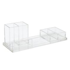 three clear acrylic boxes sitting on top of each other in front of a white background