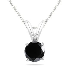 Pin it for later. Find out more single diamond necklace. 0.50 CT Round Black Diamond Solitaire Pendant In 14K White Gold. Round cut black diamond is prong set onto a 14 kt. White gold basket setting. The sparkling round black diamond weighs 0.50 ct. Diamond Color black , Clarity I2-I3 with 18' rope chain crafted in 14 kt White Gold. Single Diamond Necklace, Black Diamond Pendant, Round Diamond Pendant, Necklaces With Meaning, Black Diamond Solitaire, Black Diamond Necklace, Diamond Solitaire Pendant, Engagement Necklaces, Diamond Wedding Jewelry