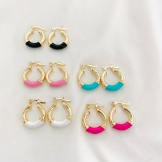 Our handmade small hoops are the perfect lightweight piece to add some color to your summer look. The simple shape and variety of bright colors make this style super versatile -- you can mix it up (like beachy waves and chunky sandals or sequins and your favorite tank top) every time you wear them! Measurement: Hoop Size: 15 x 3mm Material: 18k Gold Filled FAST & FREE SHIPPING!! Our handmade products are rated very high by our customers. We work hard with our Quality Control department to ensure Cheap Colorful Hoop Jewelry, Preppy Earrings Hoop, Summer Earrings Aesthetic, Colorful Small Hoop Earrings For Summer, Colorful Small Hoop Trendy Earrings, Colorful Trendy Hoop Earrings, Earrings Preppy, Claires Hoop Earrings, Summer Jewlery