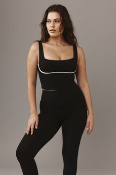 Features: Square neckline Contour seaming Structured underbust for support Cropped Pull over Support: Medium impact Sport/Activity: ﻿Suggested for hikes, yoga & pilates or any low to medium impact activities Versatile Black Activewear With Medium Bust Support, Black Compressive Activewear With Medium Bust Support, Black Relaxed Fit Mid-rise Activewear, Black Activewear With Built-in Bra For Pilates, Black Compressive Activewear With 5-inch Inseam, Monday Swimwear, Square Necklines, Ivory Color, Ribbed Fabric