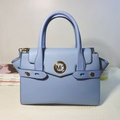 Style - Carmen. Measurements - Length - 13 X Height - 8 X Width - 5 Inches. Comes With Original Tags. Minor Scuff On Bottom Hardware Shown In Last Picture. Luxury Light Blue Top Handle Shoulder Bag, Luxury Light Blue Bag With Detachable Strap, Designer Light Blue Shoulder Bag For Daily Use, Designer Light Blue Top Handle Shoulder Bag, Luxury Light Blue Leather Shoulder Bag, Designer Blue Satchel With Adjustable Strap, Designer Light Blue Bags With Detachable Strap, Designer Light Blue Bag With Detachable Strap, Designer Light Blue Shoulder Bag With Detachable Strap