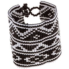 Black and white goes beautifully with everything, no matter where your wanderlust takes you. Trendy and tribal-inspired, this bracelet is perfect for pairing with summer whites or denim for a great boho look, and made by women bead artisans of La Casa in Guatemala. Since 2000, La Casa Cotzal has designed a range of Guatemalan handcrafted produced by artisan communities throughout the country. Artisans at La Casa are versed in both weaving techniques as well as in intricate bead work. The work pr Bohemian Beaded Bracelets With Black Beads For Beach, Bohemian Black Beaded Bracelets For Beach, White Beaded Bohemian Cuff Bracelet, Adjustable White Bohemian Cuff Bracelet, Bohemian White Jewelry With Black Beads, White Southwestern Beaded Bracelets For Festivals, Southwestern White Beaded Bracelets With Colorful Beads, Bohemian Beaded Cuff Bracelet For Beach, Bohemian White Cuff Bracelet With Round Beads