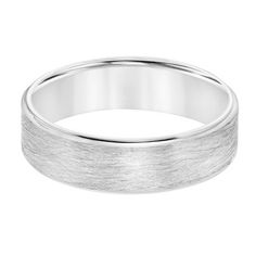 a white gold wedding ring on a white background