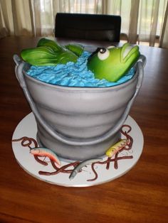 a cake made to look like a fish in a bowl