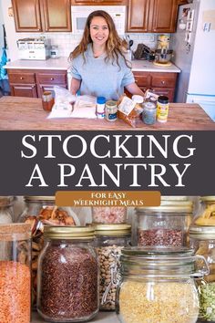 a woman standing in front of jars filled with food and spices on top of a kitchen counter