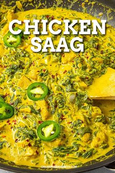 chicken saag with green peppers and onions in a skillet