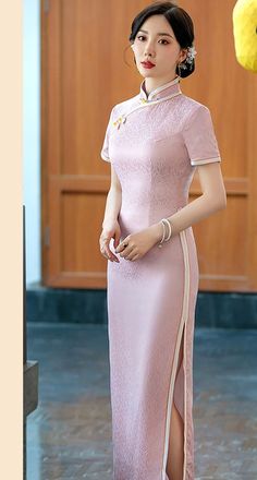 Spring Formal Cheongsam With Stand Collar, Spring Formal Short Sleeve Cheongsam, Elegant Pink Dress With Stand Collar, Formal Fitted Pink Cheongsam, Spring Elegant Cheongsam With Stand Collar, Elegant Spring Cheongsam With Stand Collar, Elegant Summer Dress For Tea Ceremony, Traditional Pink Ao Dai For Formal Occasions, Elegant Pink Ao Dai For Formal Occasions