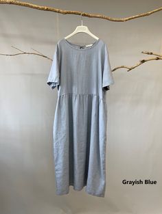 "This linen midi dress is a perfect example of beauty in simplicity. Made from breathable and soft linen, just right below the knee length, back tie at the neck line, this classic piece is such a no-brainer go to item. - Handmade with 100% medium weight linen - Short sleeves - Scoop neck - Back tie at the neckline - Below the knee length or customized length per request Please provide your shoulder width, full bust measurement ( measured around the fullest part ) and your height along with your Oversized Solid Color Midi Dress In Casual Style, Oversized Solid Color Casual Midi Dress, Casual Oversized Solid Color Midi Dress, Oversized Solid Color Midi Dress, Casual Plain Solid Linen Dress, Oversized Cotton Knee-length Midi Dress, Casual Solid Color Linen Maxi Dress, Cotton Midi Dress With Relaxed Fit, Oversized A-line Midi Dress For Summer