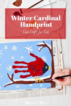 a handprinted cardinal on a tree branch with the words winter cardinal handprint