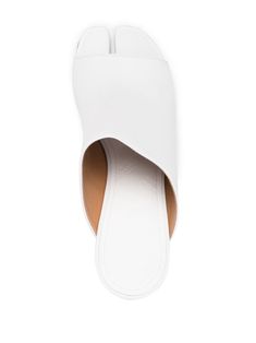 White leather peep-toe low-heel mules from Maison Margiela featuring peep toe, slip-on style, open back and low block heel. Size Info IT Color Detail White Made In Italy Material Outer: Leather 100% Lining: Leather 100% Sole: Leather 100% Season One Spring-Summer Season Two Spring-Summer Product sandals Brand Maison Margiela Size And Fit Heel 2,8 in / 7 cm; Platform 0,4 in / 1 cm Classic Open Toe Mules, Classic White Mules With Sculpted Heel, White Open Toe Classic Mules, Formal Spring Open Toe Clogs, Formal Open Toe Clogs For Spring, Modern White Closed Toe Mules, White Open Toe Mules With Sculpted Heel, Modern Mules With Branded Insole And Open Heel, Spring Open Toe Slip-ons With Leather Sole