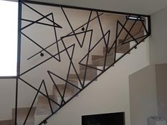 a stair case in the shape of an abstract design