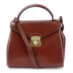 Used Salvatore Ferragamo Handbag An21-1664 Leather Brown Shoulder Bag For Women (Sku: Gzl14e51) === General === Brand : Salvatore Ferragamo === Design === Type : Handbag Material : Leather Color : Brown Gender : Women === Size === Size (Hxwxd) : 20.5cm X 25cm X 9cm / 8.07'' X 9.84'' X 3.54'' === Included Items === Accessories : None Accessories Notice : Before Purchasing, Please Refer To The Images Of The Accessories Included With The Item. === Condition === Condition : Used (Acceptable) Ranking Classic Briefcase With Top Carry Handle, Classic Crossbody Bag With Leather Lining, Classic Tan Satchel With Top Handle, Classic Tan Top Handle Satchel, Formal Cognac Bag With Top Carry Handle, Formal Cognac Crossbody Bag, Classic Cognac Shoulder Bag With Double Handle, Classic Satchel Shoulder Bag With Detachable Handle, Classic Satchel Bag With Detachable Handle