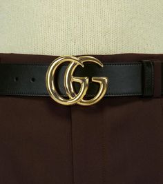 Crafted in Italy from leather, this black belt from Gucci features the label's double G buckle logo in gold, this style comes with punch holes for an adjustable fit..Color of fastening: gold.Made in Italy.Material: calf leather.Width 4cm-1.5' Luxury Black Belt Buckle With Gold-tone Logo Plaque, Designer Belt With Gold-tone Logo For Business, Designer Business Belts With Gold Buckle, Designer Black Belts With Gold-tone Logo Plaque, Gucci Designer Belt Buckles For Business, Elegant Black Belt Buckle With Gold-tone Logo, Designer Black Belt With Gold-tone Logo Plaque, Modern Black Belt With Gold-tone Logo Plaque, Gold Leather Belts With Gold-tone Logo Plaque