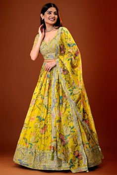 Beautiful Georgette floral print Croptop lehanga with sequin embellishments size XXL 44 ready to ship. Make a radiant statement at your Haldi ceremony with our exquisite Yellow Floral print Georgette Lehenga Set! Crafted with meticulous embroidery work, this ensemble exudes elegance and charm. The vibrant yellow hue adds a pop of color, perfect for celebrating the joyous occasion. Fabric Details: Top: Georgette Bottom: Georgette Dupatta: Organza Color Details: Top: Yellow Bottom: Yellow Dupatta: Floral Print Semi-stitched Sharara For Reception, Anarkali Style Floral Print Sharara For Party, Party Anarkali Lehenga With Floral Print, Reception Floral Print Georgette Anarkali Set, Georgette Anarkali Set For Reception With Floral Print, Semi-stitched Floral Print Sharara For Wedding, Floral Print Dupatta For Diwali Reception, Bollywood Floral Print Sharara For Navratri, Bollywood Style Floral Print Sharara For Eid