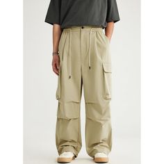 N-257-12 Solid Parachute Pants For Summer Outdoor, Summer Outdoor Solid Color Parachute Pants, Summer Wide-leg Parachute Pants With Pockets, Summer Outdoor Relaxed Fit Parachute Pants, Khaki Summer Outdoor Pants, Summer Outdoor Solid Color Pants, Summer Outdoor Cargo Pants With Pockets, Summer Full-length Wide Leg Cargo Pants, Khaki Full-length Cargo Pants For Summer