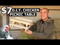 a man holding a wooden table with a chicken on it and the words $ 7 diy chicken picnic table