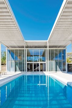 an empty swimming pool in the middle of a house