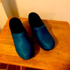 Never Worn, Beautiful Fur Of A Deep Ocean Blue Sanitas Clogs! Only Tried On One Time. Color Is So Pretty And Unique! Comfortable Blue Clogs With Round Toe, Comfortable Blue Closed Toe Clogs, Blue Closed Toe Clogs With Removable Insole, Blue Slip-on Clogs With Wooden Heel, Casual Blue Clogs With Wooden Heel, Blue Clogs With Wooden Heel And Round Toe, Mule Clogs, Mules Shoes, Blue Ocean