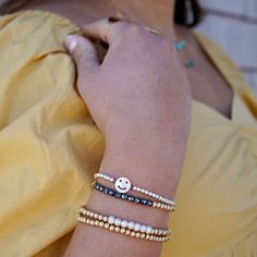 Every day is a good day for our Smiley Face Bead Bracelet 😊. Add a little unexpected dash of fun and sass to your bracelet stack with this fun and super stylish piece. 3mm quality sterling silver beads strung on super strong stretch cord accented with a gorgeous mother of pearl smiley face charm. Perfect for creating layered looks or wearing one alone. How to figure out your wrist size: use a soft measuring tap to measure your wrist. make sure to wrap the measuring tape around your wrist so tha Bead Stringing, Measuring Tape, Initial Charm, Personalized Necklace, Bracelet Stack, Sterling Silver Bead, Smiley Face, 14kt Gold, Bead Bracelet