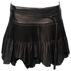 ▪ Archival Jean Paul Gaultier Leather Mini Skirt ▪ Fall-Winter 2003 ▪ Constructed from black leather ▪ Cartridge pleats ▪ Raw-edge hem ▪ Self-tie wrap fastening ▪ IT42 - FR38 - UK10 ▪ Made in Italy The photographs presented in this listing, with the exception of any reference or runway imagery, require proper credit to be attributed to the copyright owner, in order to perform specific actions such as copying the images or sharing them online. It is strictly prohibited to utilise the images for s Cartridge Pleat Skirt, Cartridge Pleats, Jean Paul Gaultier Women, Festival Attire, Mini Wrap Skirt, White Pleated Skirt, Mini Wrap, Tie Wrap, Leather Mini Skirt