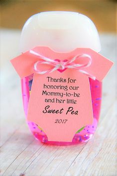 a pink jar with a tag on it that says thanks for mom - in - law and her little sweet pea