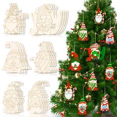 a christmas tree decorated with ornaments and santa clause decorations on it's top, next to cut outs