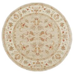 a round rug with an ornate design in beige and orange colors on a white background