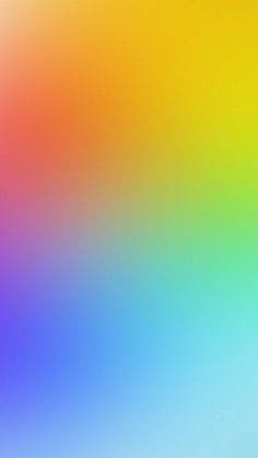 a blurry image of an orange, yellow and blue background with the same color