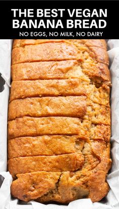 a loaf of bread sitting on top of a pan filled with batter and sliced into slices