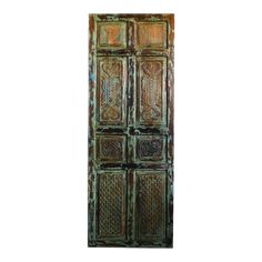 an old wooden door with intricate carvings on it