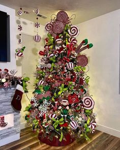 a christmas tree decorated with candy canes and ornaments