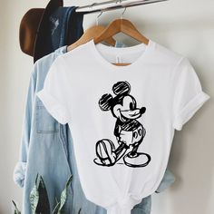 Mickey Sketch Disney Shirts, Mickey Ears Shirt, Toddler Birthday Shirt, Disney Shirt Welcome To Hollywood Prints! - Your Shirt Will Be Made In A Smoke And Pet Free Environment Soon After You Place Your Order. - Shirts Are Priced Individually. - This Item Is Made-To-Order So No Returns Or Refunds Will Be Accepted! We Guarantee High Quality Products! - We Accept Custom Orders. Please Get In Touch With Us And We Will Do Our Best For You. *** Processing Times *** - 5-7 Business Days* *Does Not Inclu Disney 2024 Shirts, Disney Clothes For Women, Mickey Sketch, Sketch Disney, Universal Trip, Ropa Upcycling, Disney Apparel, Disney 2023, Disneyland Shirt