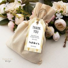 a thank you bag with flowers in the background