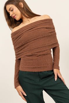 Enhance your style with this sophisticated Fuzzy Off-Shoulder Textured Knit Top. Boasting a unique combination of ribbed and fuzzy textures, this knit top is not only stylish but also comfortable. The off-shoulder neckline adds a touch of sophistication, making it suitable for both casual and dressy occasions. Pair it with tailored trousers or a skirt for a chic and effortless outfit that exudes elegance. Features: Basic style Stretch: Moderate stretch Material composition: 50% polyester, 40% ny Trendy Off-shoulder Ribbed Sweater, Trendy Off-shoulder Knit Top, Winter Ribbed Off-shoulder Tops, Ribbed Off-shoulder Winter Tops, Brown Winter Party Tops, Winter Party Brown Tops, Chic Textured Knit Tops For Winter, Chic Textured Knit Winter Tops, Chic Brown Ribbed Knit Top