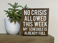 a wooden sign that says no crisss allowed this week my schedule is already full