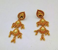 22karat yellow gold handmade tribal designer stud earrings. lab tested 916/22k hallmarking.Weight-8.400 grams approx.Metal-22 k yellow gold .length-5 cm approx.brand-handmade.condition-excellent condition,brand new.for more information please see the photo'sgold jewelry is handmade designer jewelry. so, there can be slight difference in size and weight of the article in the comparison of the description. Gold Dual-tone Temple Jewelry Earrings, Gold Dual-tone Ceremonial Earrings, Gold Dual-tone Earrings For Ceremonial Occasions, Traditional 22k Gold Bridal Earrings, Traditional Heavy 22k Gold Earrings, Traditional Yellow Gold Kundan Danglers, Dual-tone Earrings For Puja And Festivals, Heavy 22k Gold Earrings For Puja, 22k Gold Bollywood Earrings For Puja